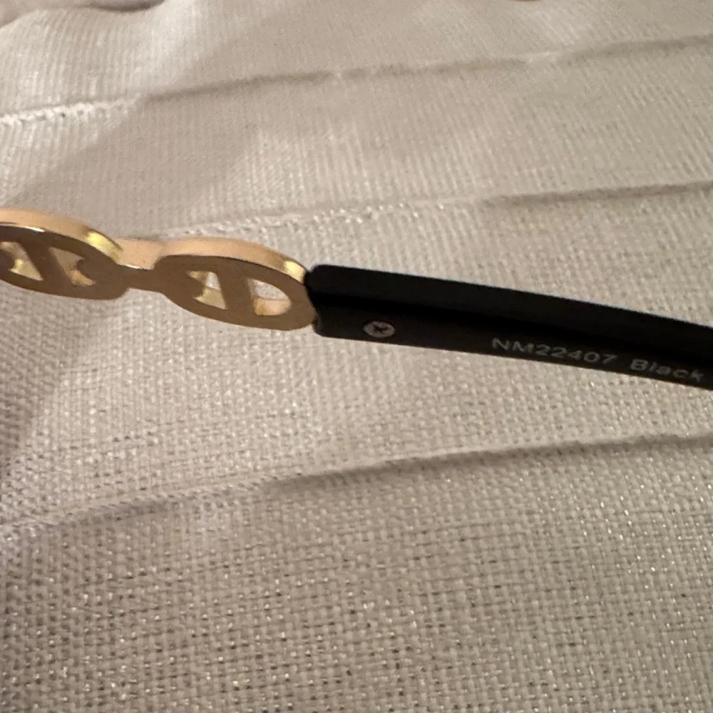 Nicole Miller Elegant Black and Gold Sunglasses